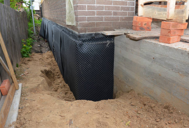 SJ Waterproofing Pros technician performing targeted Sump Pump Installation assessment in Georgetown, TN